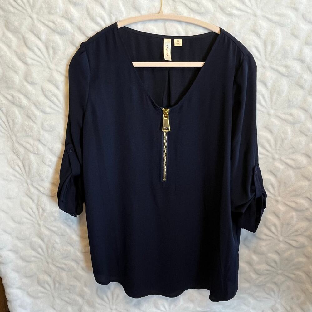 Tacera navy blue top with gold front zipper accent and roll sleeves size M